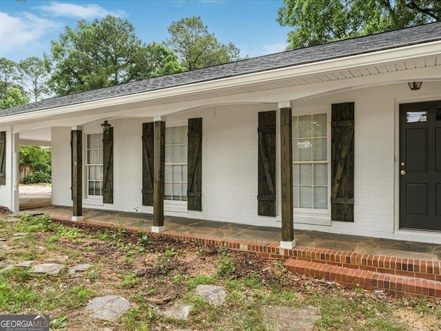 1110 Upper Hembree Rd, Roswell, GA 30076 - entrance to property featuring brick siding, covered porch, and a shingled roof