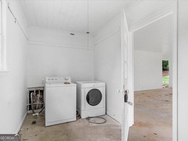 1110 Upper Hembree Rd, Roswell, GA 30076 - washroom featuring washer and clothes dryer and ornamental molding