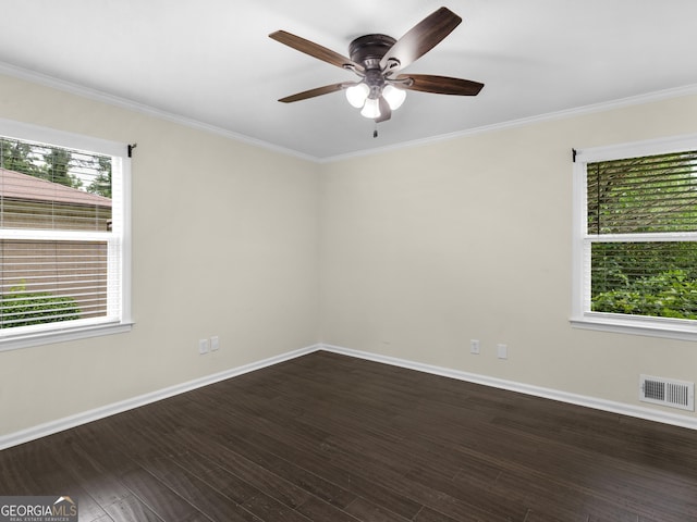 117 Thomas St, Griffin, GA 30224 - empty room with a ceiling fan, baseboards, wood finished floors, and crown molding