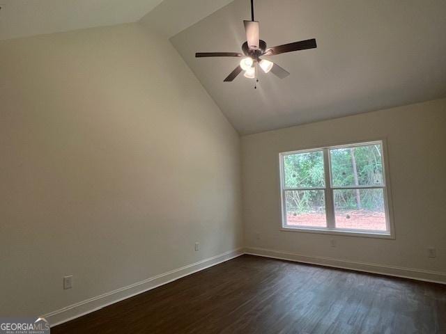 189 Warner Rd, Barnesville, GA 30204 - empty room with lofted ceiling, dark wood finished floors, a ceiling fan, and baseboards