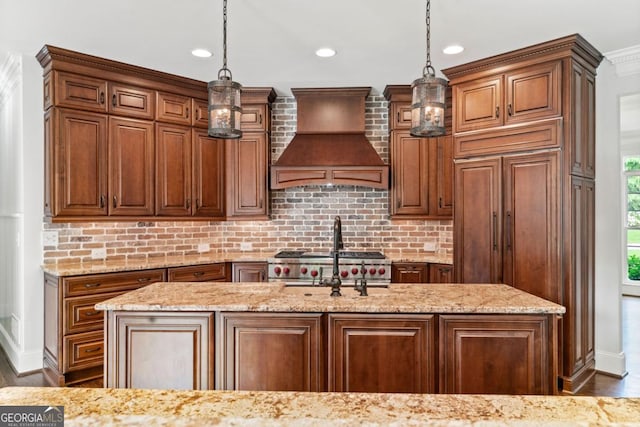 590 Arthur Rd, Canton, GA 30115 - kitchen with custom exhaust hood, backsplash, light stone counters, wood finished floors, and recessed lighting