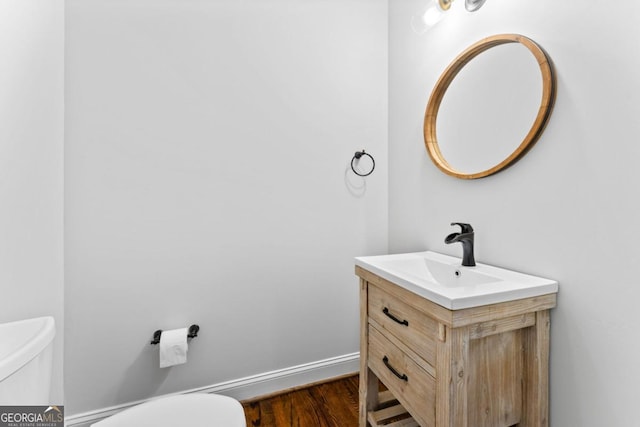 590 Arthur Rd, Canton, GA 30115 - half bathroom with vanity and wood finished floors