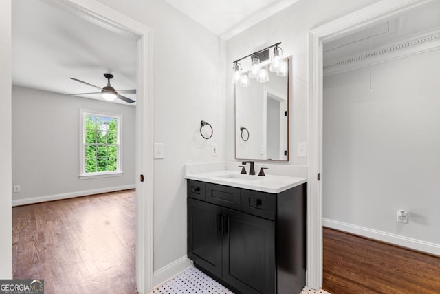 590 Arthur Rd, Canton, GA 30115 - bathroom with ceiling fan, vanity, and wood finished floors