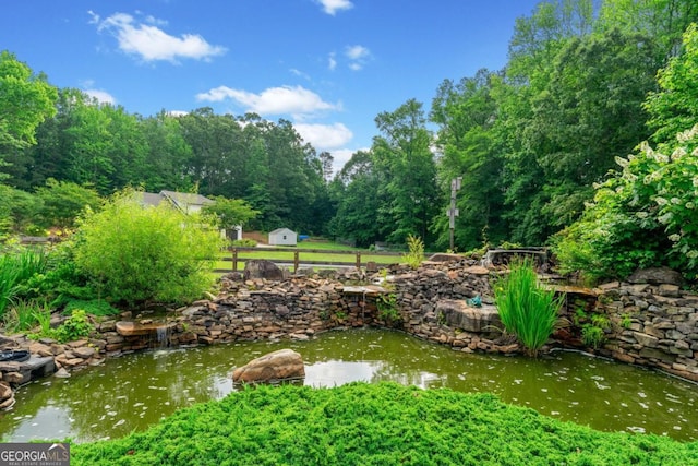 590 Arthur Rd, Canton, GA 30115 - view of yard featuring a garden pond
