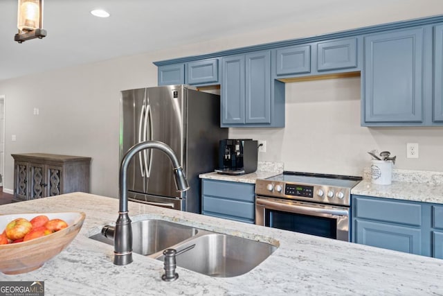 590 Arthur Rd, Canton, GA 30115 - kitchen featuring stainless steel appliances, blue cabinets, light stone counters, and recessed lighting