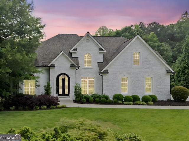 590 Arthur Rd, Canton, GA 30115 - french provincial home with a front yard, brick siding, and roof with shingles