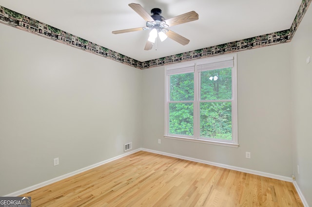 165 Hidden Lake Dr, Fayetteville, GA 30215 - empty room with baseboards, wood finished floors, and ceiling fan