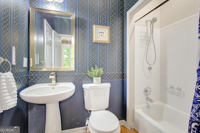 165 Hidden Lake Dr, Fayetteville, GA 30215 - bathroom with wallpapered walls, toilet, and shower / tub combo