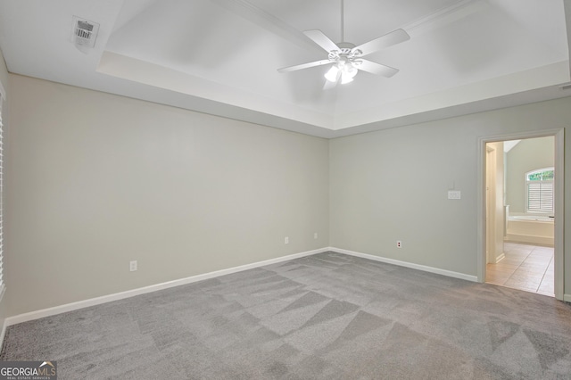 165 Hidden Lake Dr, Fayetteville, GA 30215 - unfurnished room featuring a tray ceiling, a ceiling fan, carpet floors, and baseboards