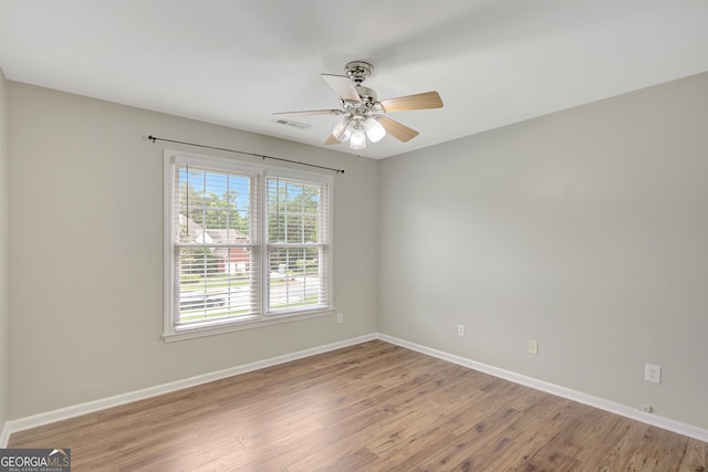 165 Hidden Lake Dr, Fayetteville, GA 30215 - unfurnished room featuring light wood finished floors, ceiling fan, and baseboards