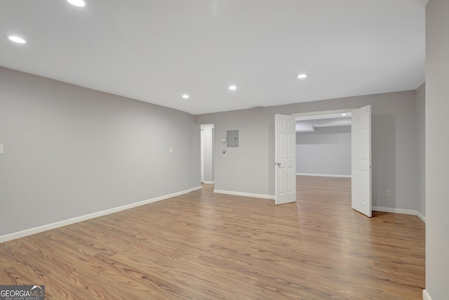 165 Hidden Lake Dr, Fayetteville, GA 30215 - spare room featuring recessed lighting, electric panel, light wood-style flooring, and baseboards