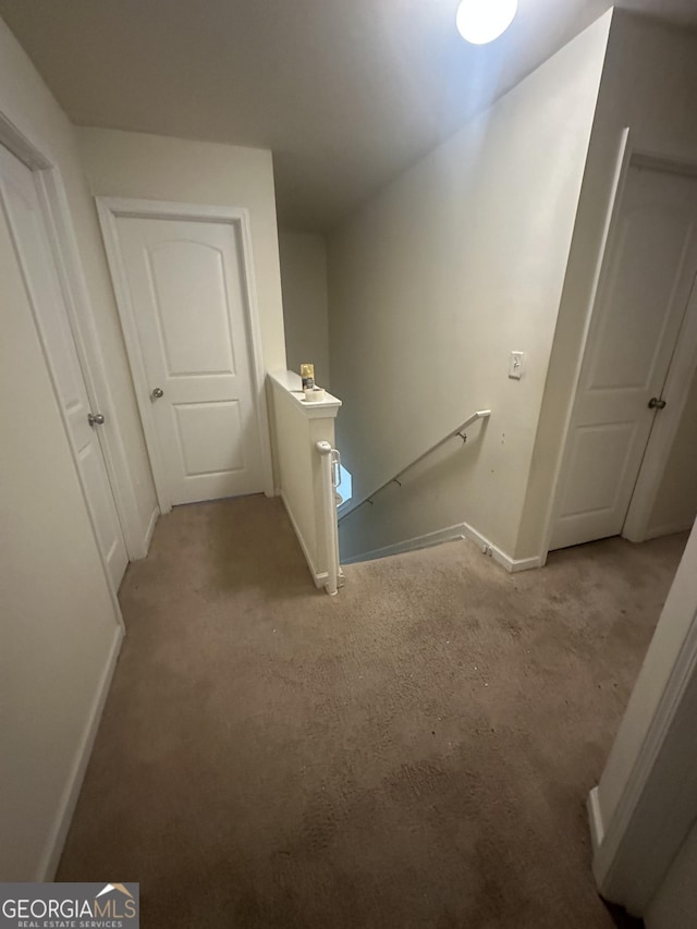 287 Ella Ct, Columbus, GA 31907 - hallway featuring an upstairs landing, carpet flooring, and baseboards