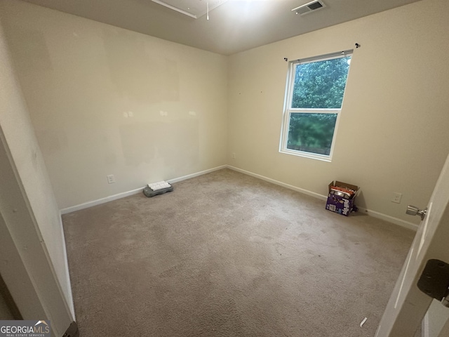 287 Ella Ct, Columbus, GA 31907 - spare room with baseboards, carpet flooring, and attic access