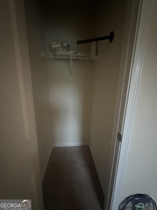 287 Ella Ct, Columbus, GA 31907 - walk in closet featuring dark colored carpet