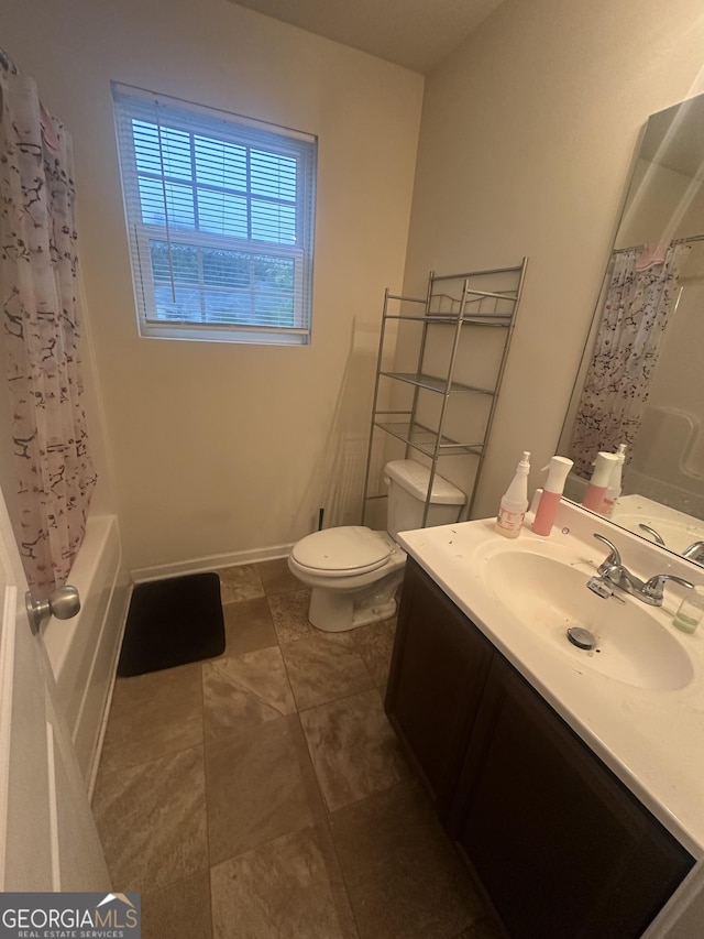 287 Ella Ct, Columbus, GA 31907 - full bath with vanity, toilet, shower / tub combo, tile patterned flooring, and baseboards