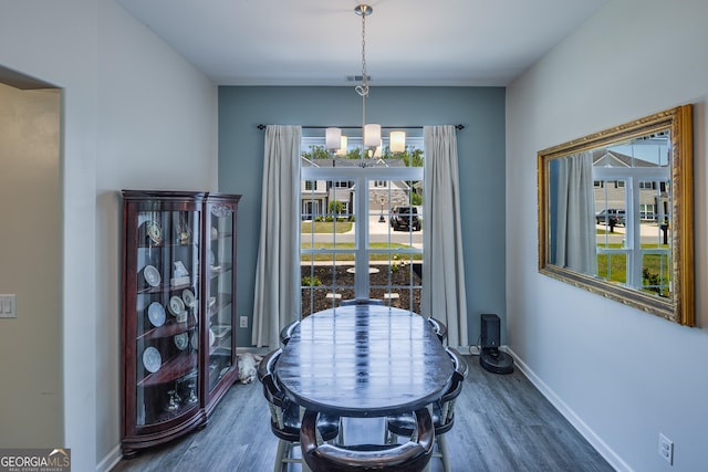 104 Johansen Way, Kingsland, GA 31548 - dining room featuring dark wood-style flooring and a chandelier