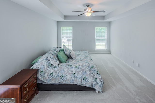 104 Johansen Way, Kingsland, GA 31548 - bedroom with light colored carpet, a raised ceiling, and ceiling fan