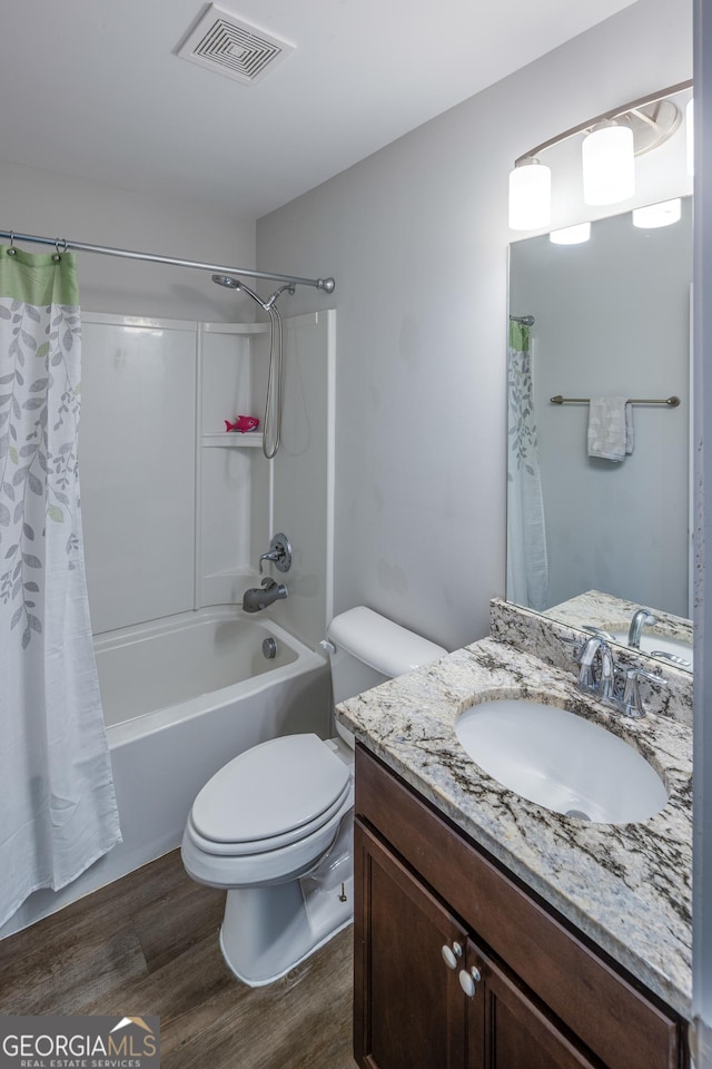104 Johansen Way, Kingsland, GA 31548 - full bathroom with wood finished floors, vanity, and shower / bath combo with shower curtain