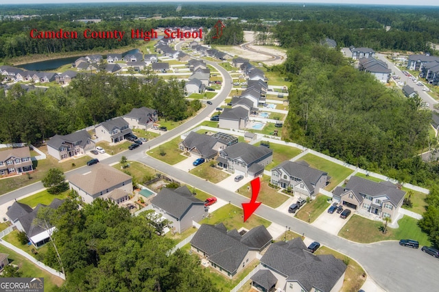 104 Johansen Way, Kingsland, GA 31548 - aerial overview of property's location with nearby suburban area and a nearby body of water