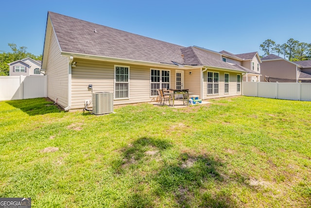 104 Johansen Way, Kingsland, GA 31548 - rear view of house with a fenced backyard, a patio area, and a shingled roof