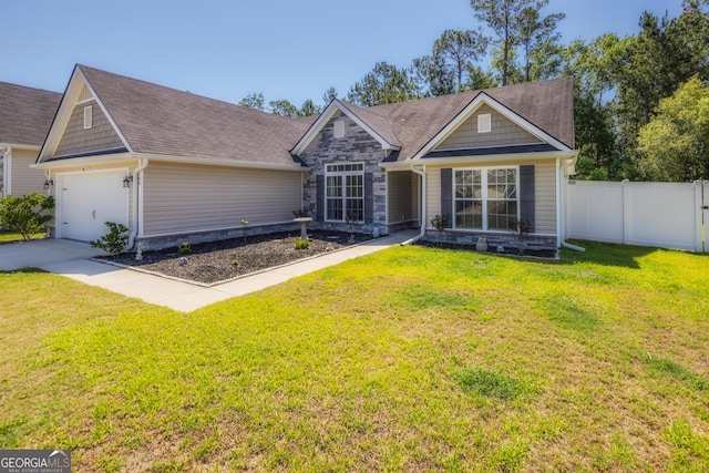 104 Johansen Way, Kingsland, GA 31548 - single story home with stone siding, a garage, and driveway