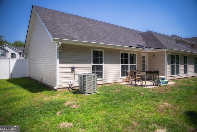 104 Johansen Way, Kingsland, GA 31548 - rear view of house featuring a patio and a shingled roof