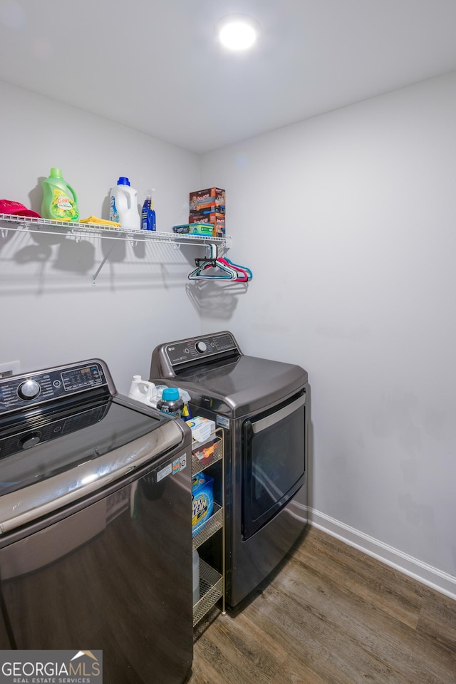 104 Johansen Way, Kingsland, GA 31548 - laundry room with washer and clothes dryer and wood finished floors