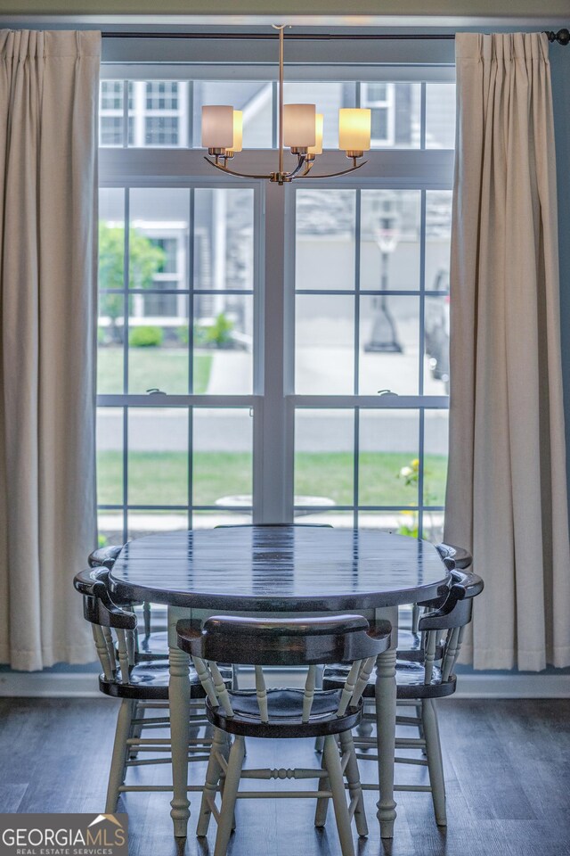 104 Johansen Way, Kingsland, GA 31548 - dining room featuring a chandelier and wood finished floors
