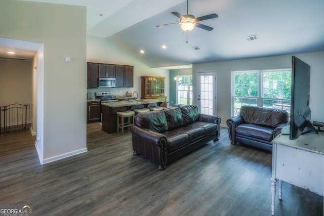 104 Johansen Way, Kingsland, GA 31548 - living room with lofted ceiling, a ceiling fan, and dark wood finished floors