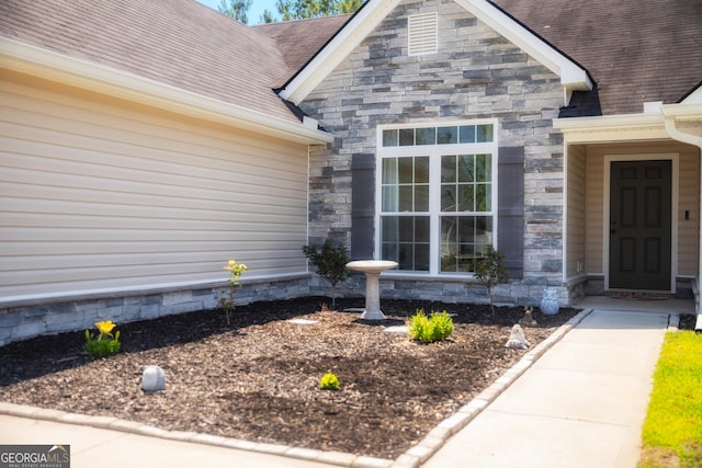 104 Johansen Way, Kingsland, GA 31548 - doorway to property featuring stone siding and a shingled roof