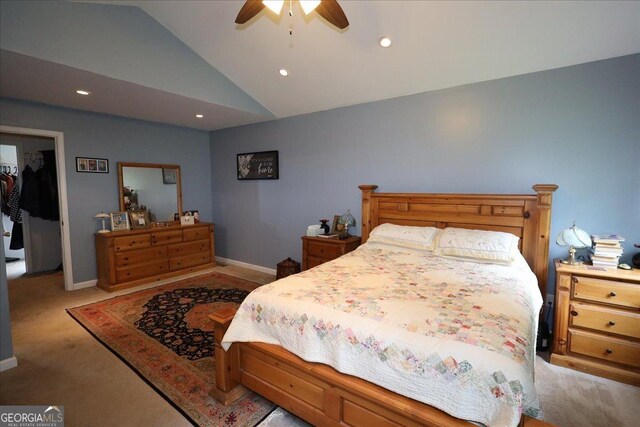 236 Hiram Sudie Rd, Dallas, GA 30157 - carpeted bedroom with vaulted ceiling, recessed lighting, baseboards, ceiling fan, and a walk in closet