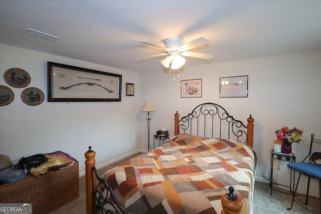 236 Hiram Sudie Rd, Dallas, GA 30157 - carpeted bedroom with baseboards and a ceiling fan