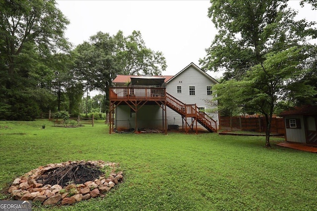236 Hiram Sudie Rd, Dallas, GA 30157 - rear view of property featuring stairway, a wooden deck, a fire pit, and central AC
