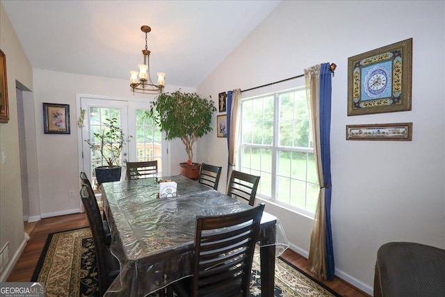 236 Hiram Sudie Rd, Dallas, GA 30157 - dining room with a chandelier, baseboards, plenty of natural light, lofted ceiling, and french doors