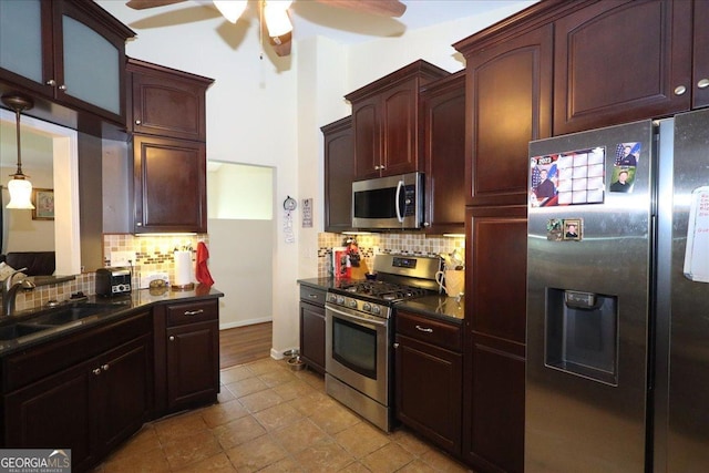 236 Hiram Sudie Rd, Dallas, GA 30157 - kitchen with stainless steel appliances, a sink, ceiling fan, and tasteful backsplash