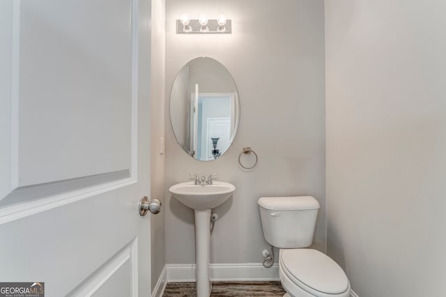 31 Blarneystone Way, Adairsville, GA 30103 - bathroom with toilet, baseboards, and a sink
