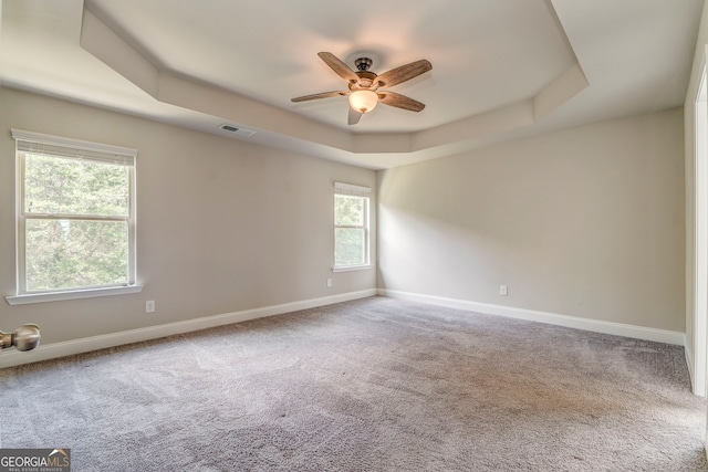 31 Blarneystone Way, Adairsville, GA 30103 - spare room featuring a raised ceiling, ceiling fan, carpet, and baseboards
