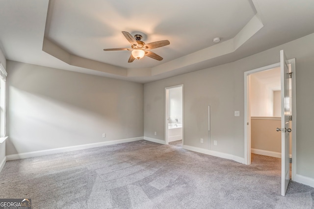 31 Blarneystone Way, Adairsville, GA 30103 - unfurnished bedroom featuring a raised ceiling, carpet flooring, baseboards, ensuite bath, and ceiling fan