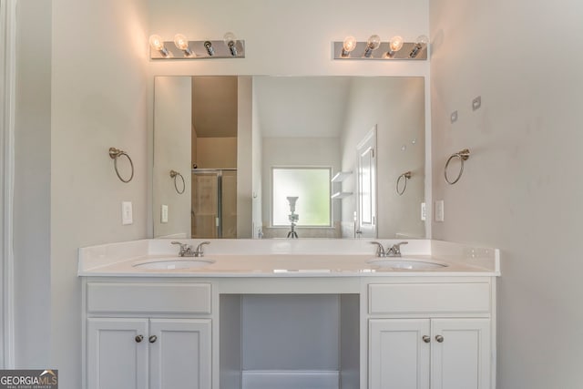 31 Blarneystone Way, Adairsville, GA 30103 - bathroom featuring double vanity and a shower with shower door