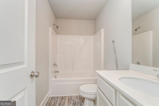 31 Blarneystone Way, Adairsville, GA 30103 - bathroom with vanity, toilet, shower / tub combination, and wood finished floors