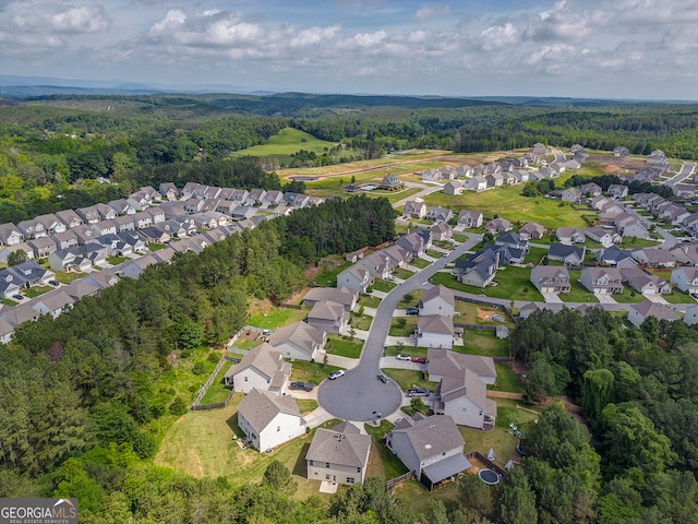 31 Blarneystone Way, Adairsville, GA 30103 - aerial view of property and surrounding area featuring a heavily wooded area and nearby suburban area