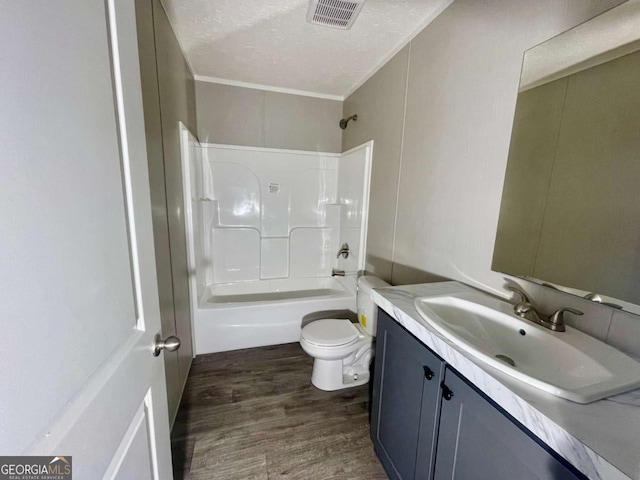 429 Avant Rd, Eatonton, GA 31024 - full bathroom with vanity, toilet, wood finished floors, shower / bath combination, and crown molding
