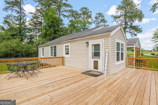 1055 Wrens Hwy, Thomson, GA 30824 - deck with outdoor dining area