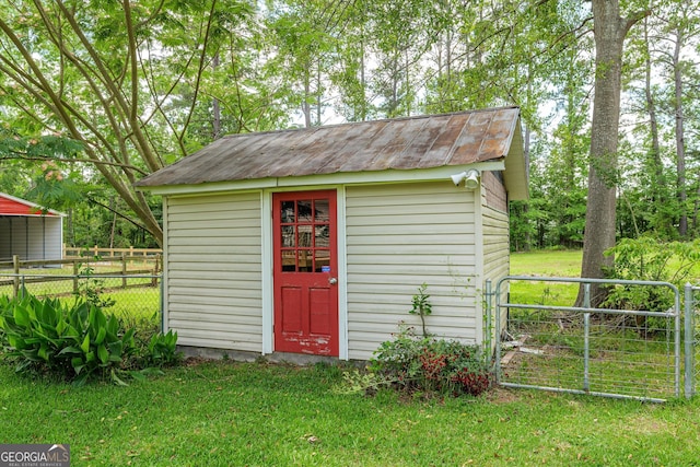 1055 Wrens Hwy, Thomson, GA 30824 - view of shed with a detached carport