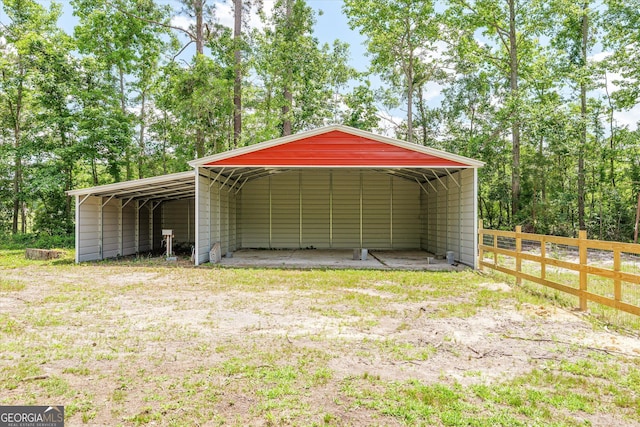 1055 Wrens Hwy, Thomson, GA 30824 - view of outdoor structure with a detached carport and driveway