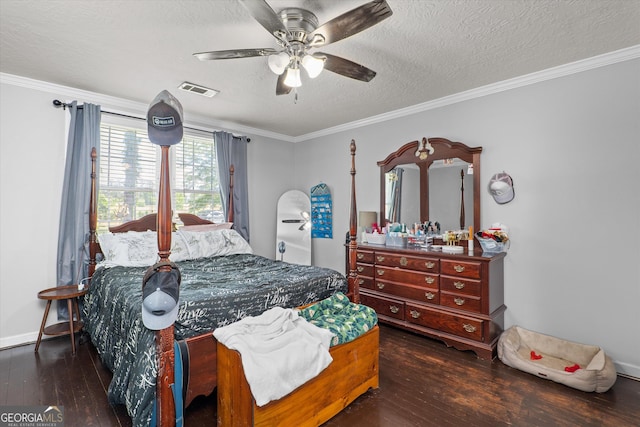 1055 Wrens Hwy, Thomson, GA 30824 - bedroom with hardwood / wood-style floors, a textured ceiling, crown molding, a ceiling fan, and baseboards