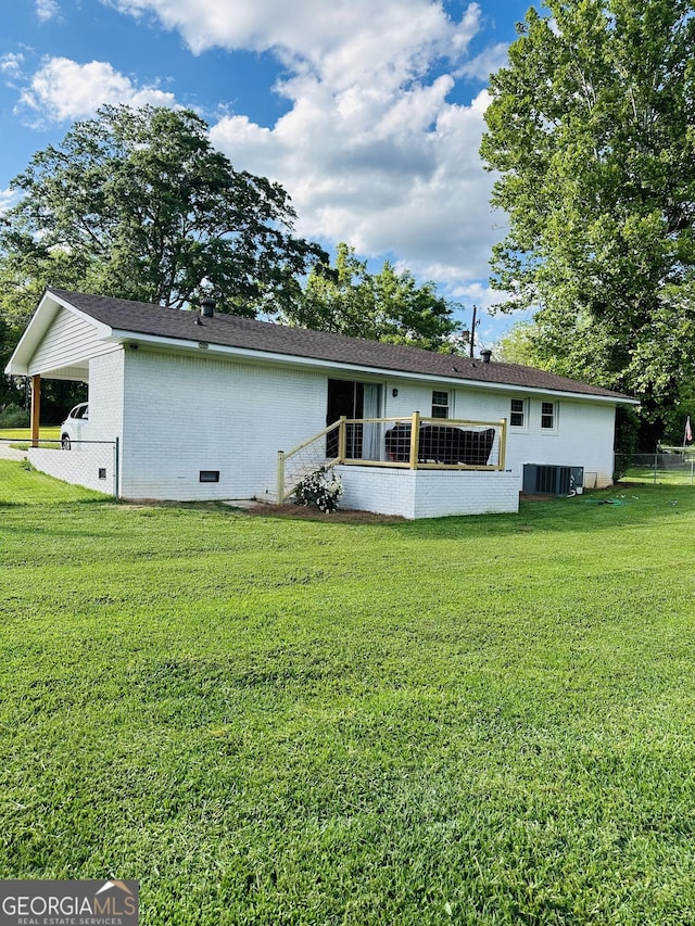 277 N Old Alabama Rd, Thomaston, GA 30286 - back of house featuring brick siding, crawl space, central AC unit, and an attached carport