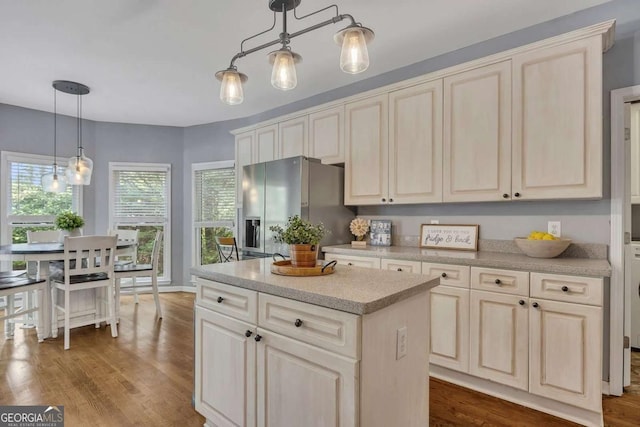 320 Ironhill Trce, Woodstock, GA 30189 - kitchen featuring stainless steel refrigerator with ice dispenser, dark wood-style flooring, and hanging light fixtures