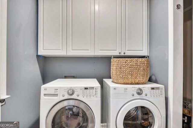 320 Ironhill Trce, Woodstock, GA 30189 - laundry room with independent washer and dryer and cabinet space