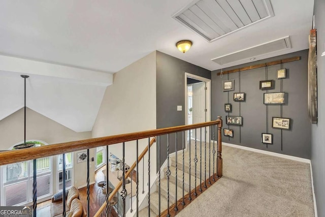 320 Ironhill Trce, Woodstock, GA 30189 - hall with attic access, carpet flooring, baseboards, and an upstairs landing